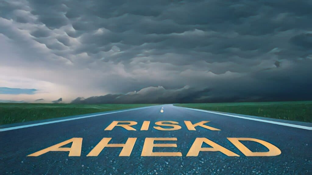 Real Estate Investing Myths Debunked risk ahead road roadway street cloudy storm rain tornado dusk