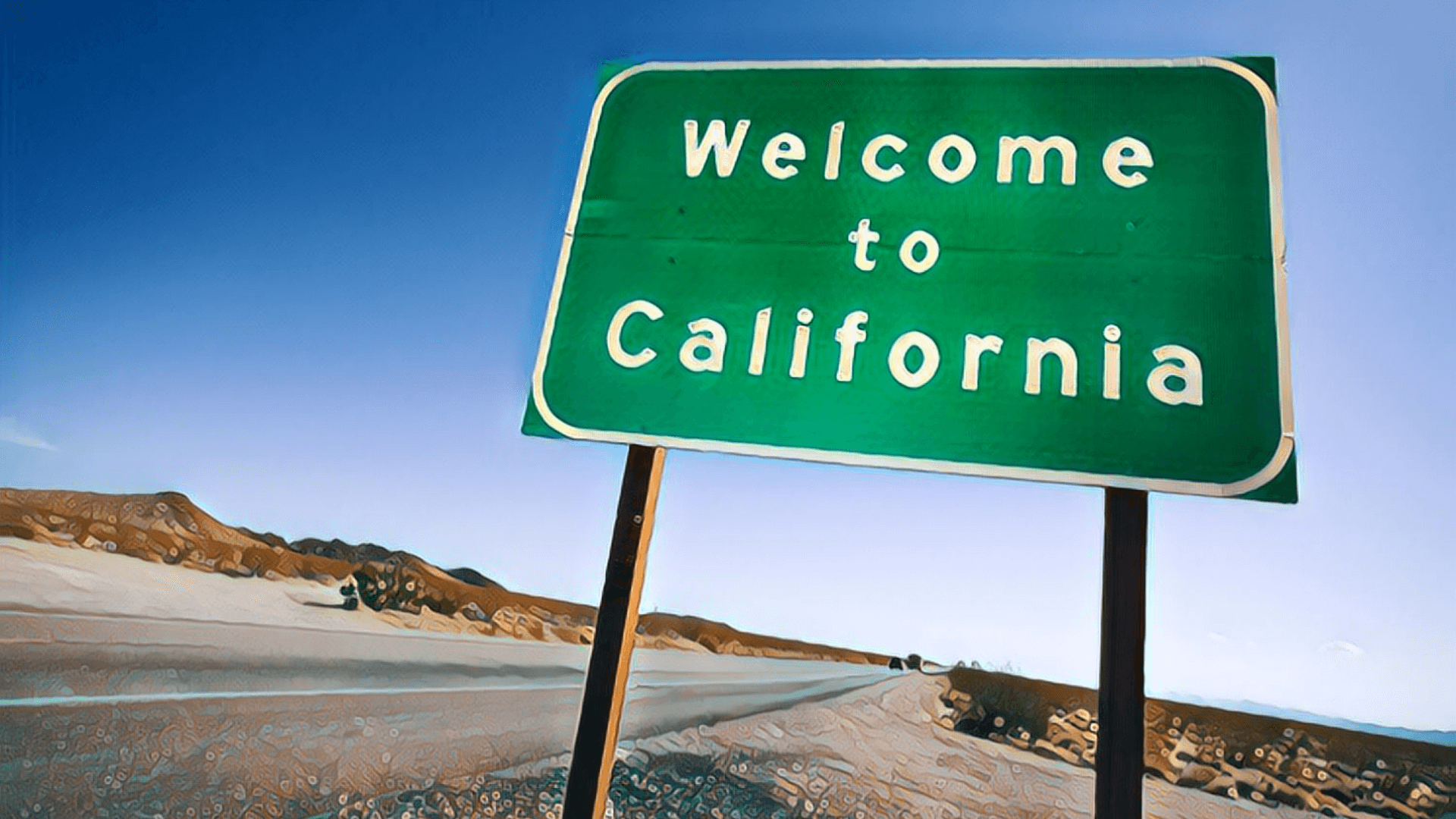 Ultimate Guide to California Real Estate Investing - welcome to California sign on the side of a desert road, blue sky, day time, sunshine