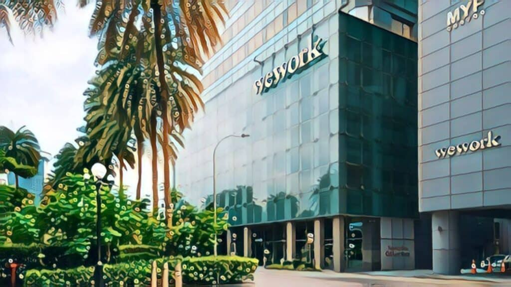 WeWork Fights for Survival (Renegotiation Pleas While Locations Flounder) - WeWork building exterior with palm trees
